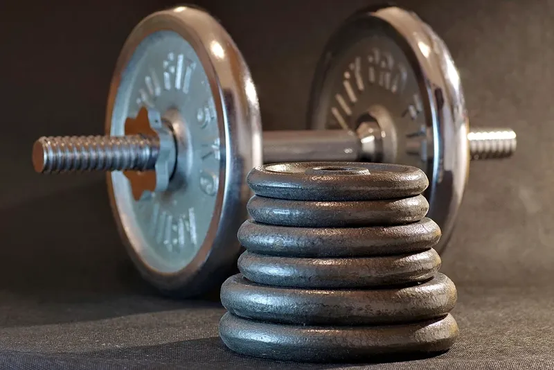 Weight plates stacked on a dumbbell
